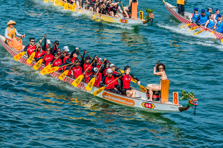 Hong Kong, China- June 2 , 2014: People racing the Dragon boats festival race in Stanley beach